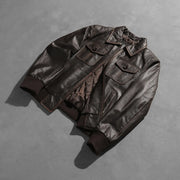 
Как выглядит на человеке:  Aaron Distressed Brown Leather Bomber Jacket на модели — естественные складки при дневном свете