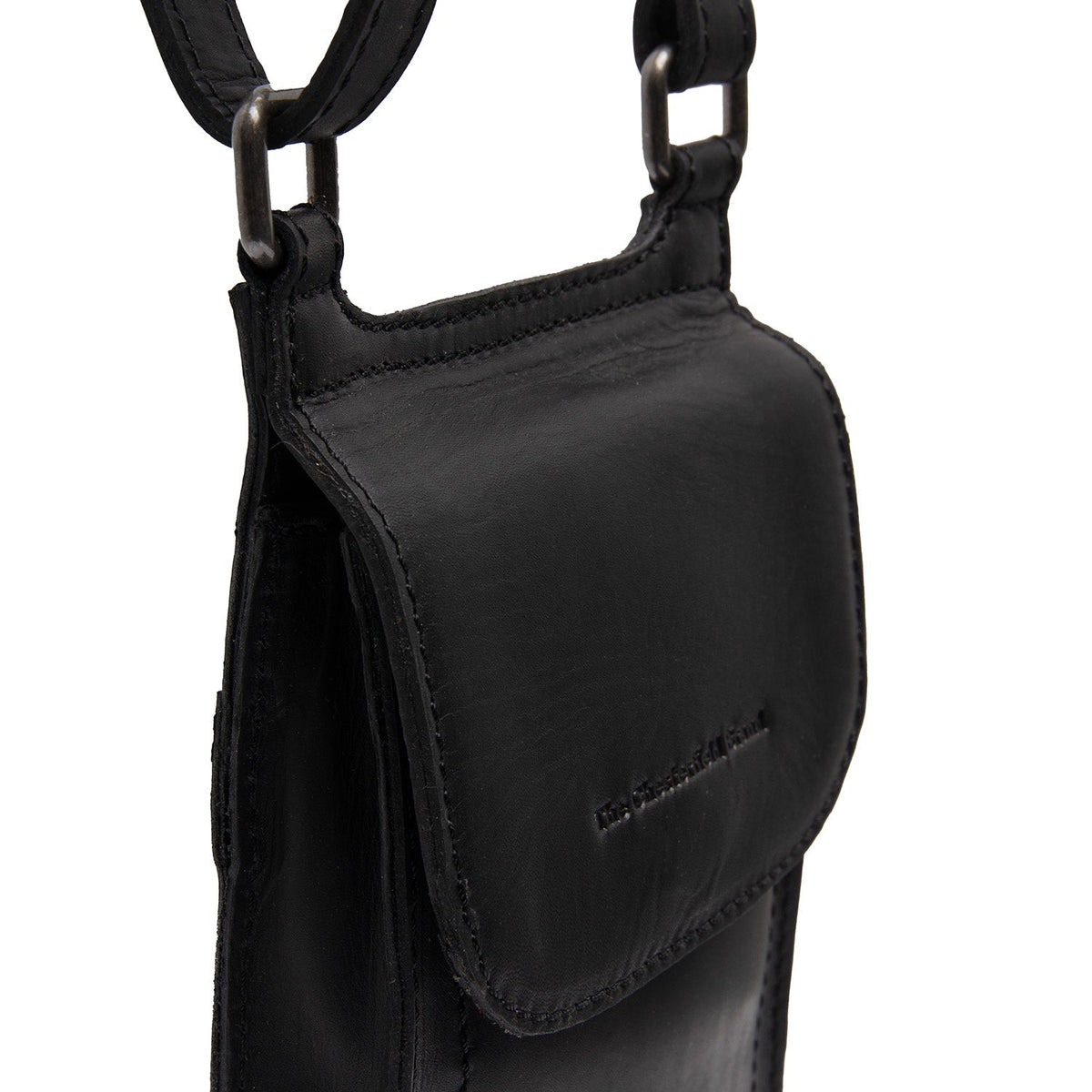
Nebra Цельнозерновая кожа Phone Bag - Вид сбоку, демонстрирующий эргономичный крой рукава