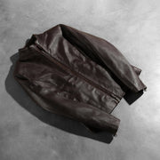 
Zipper & Hem Craftsmanship Construction Detail on Rumella Maroon Leather Biker Jacket